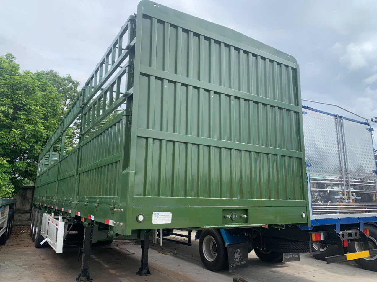 SƠ MI RƠ MOÓC LỒNG ANTU 12.4M 3 TRỤC